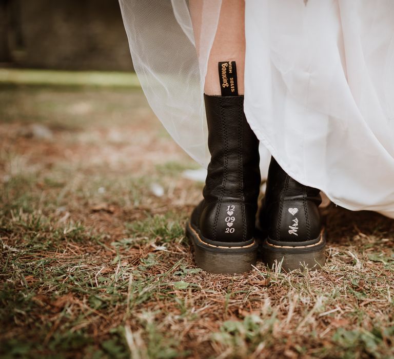 Personalised wedding Dr Martens with the wedding date 