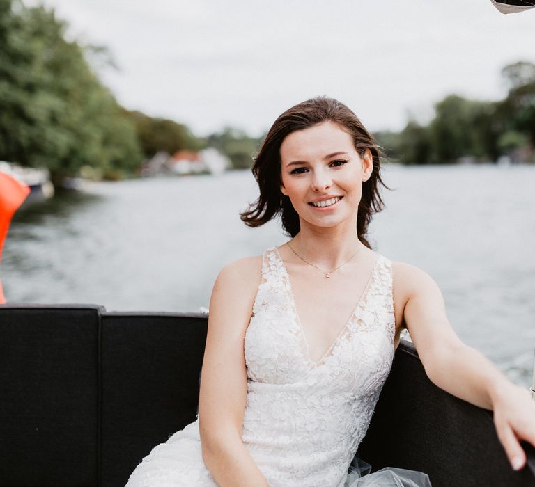 Bride on boat during her wedding day 