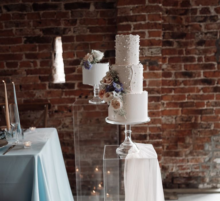 Candles and draped tulle material decorated the barn