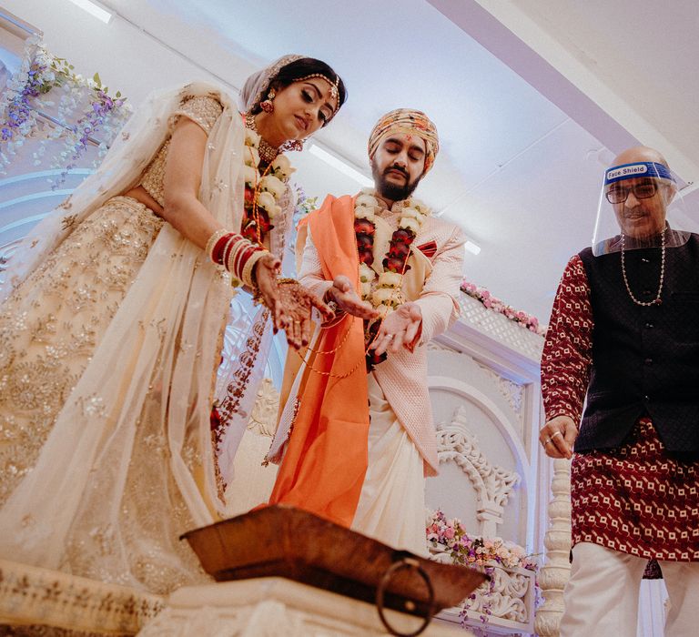 Bride & groom during Hindu ceremony 