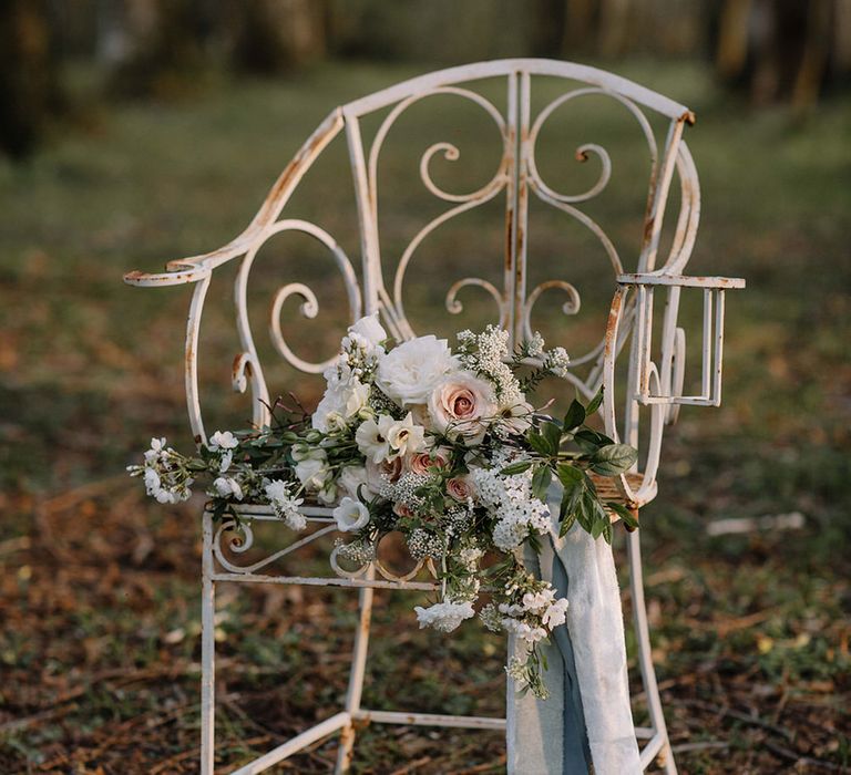 Rustic french chic outdoor seating in the woods at Chateau de la Ruche