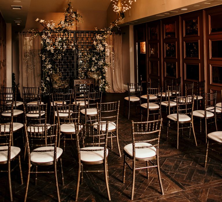 Aisle lined with chairs for wedding ceremony