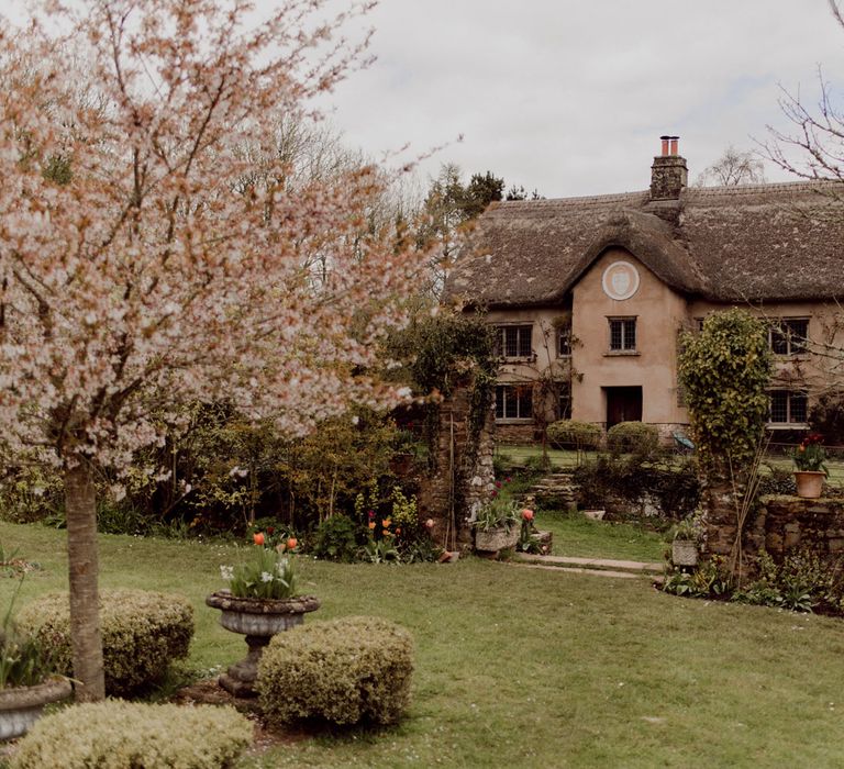 Exterior of Hayne Devon for garden party wedding with applique veil