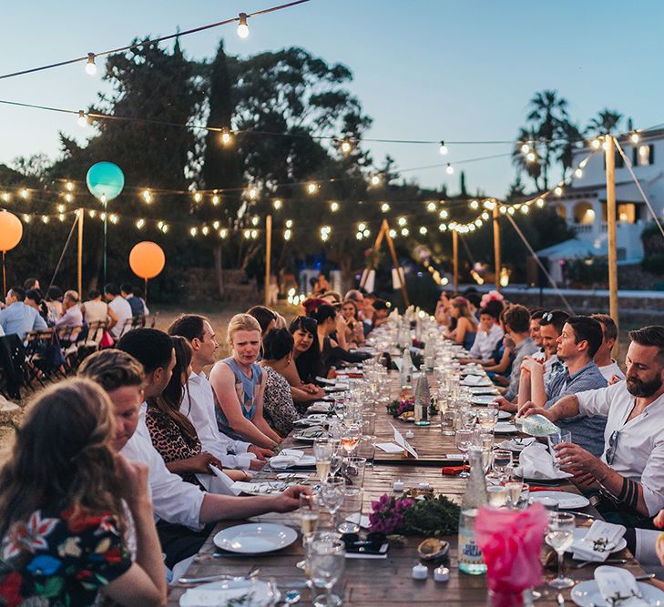 Wedding guests outdoors for wedding reception in Menorca