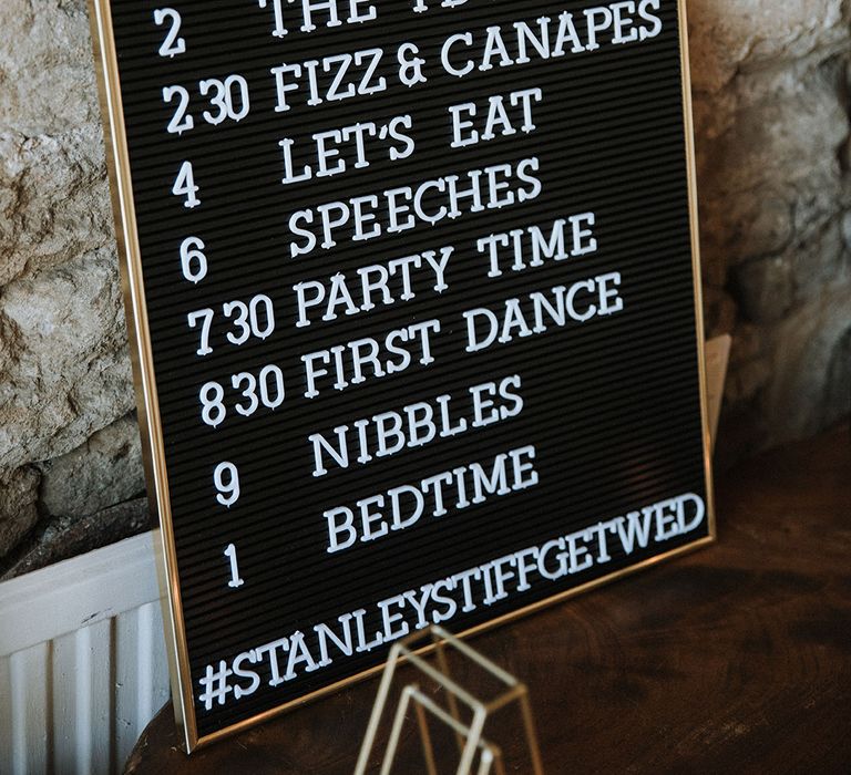 Peg Board order of the day wedding sign