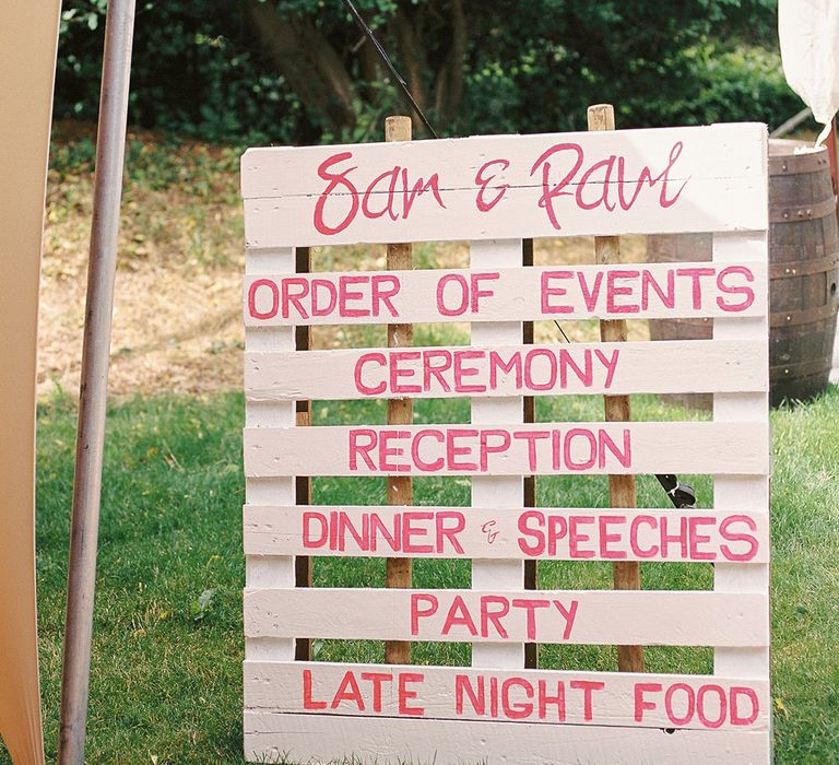 Wooden order of the day wedding sign