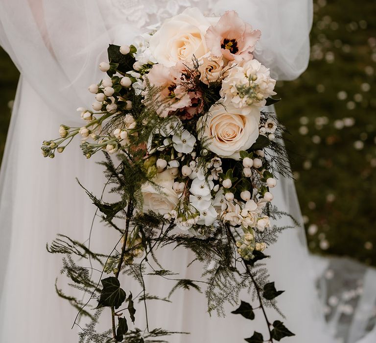 cascading wedding bouquet bush pink and peach roses, stocks and berries