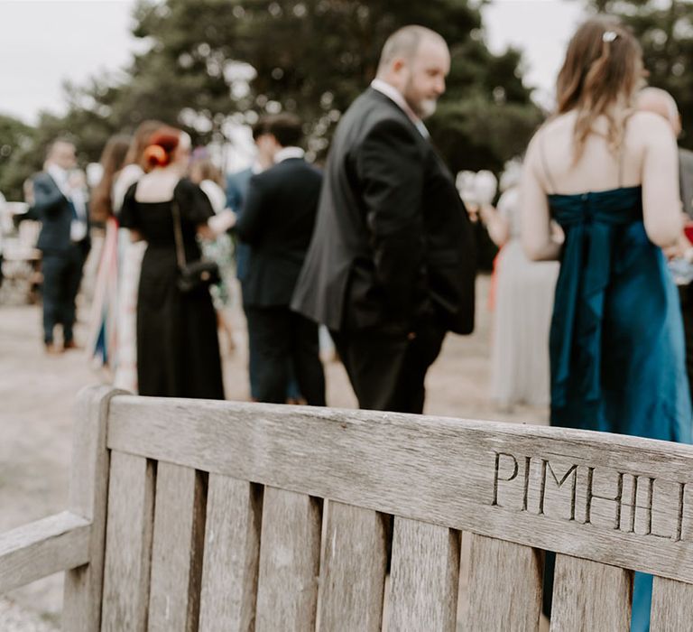 Engraved wooden bench at Pimhill Barn wedding venue 