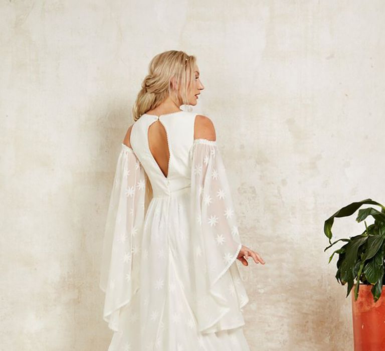 Sustainable wedding dress with dramatic detachable sleeves from Indiebride London in boho style