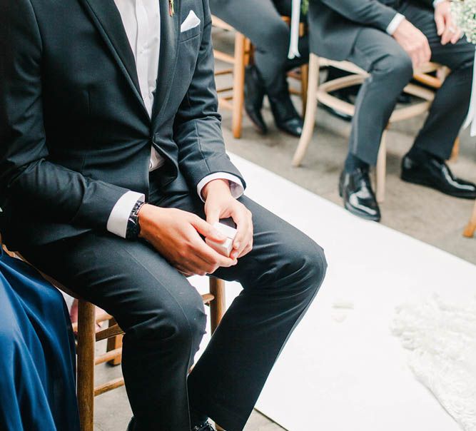 Best man at the altar in tuxedo and bow tie