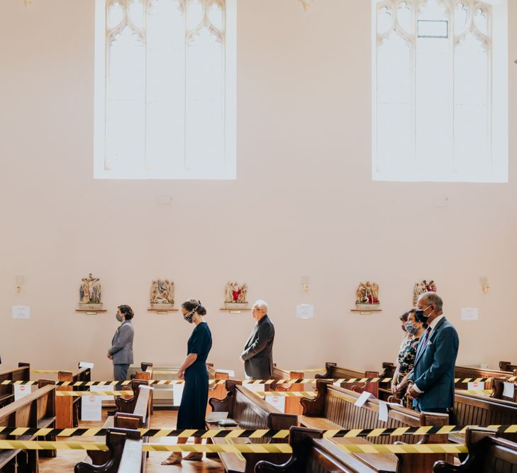 Guests at socially distanced wedding 