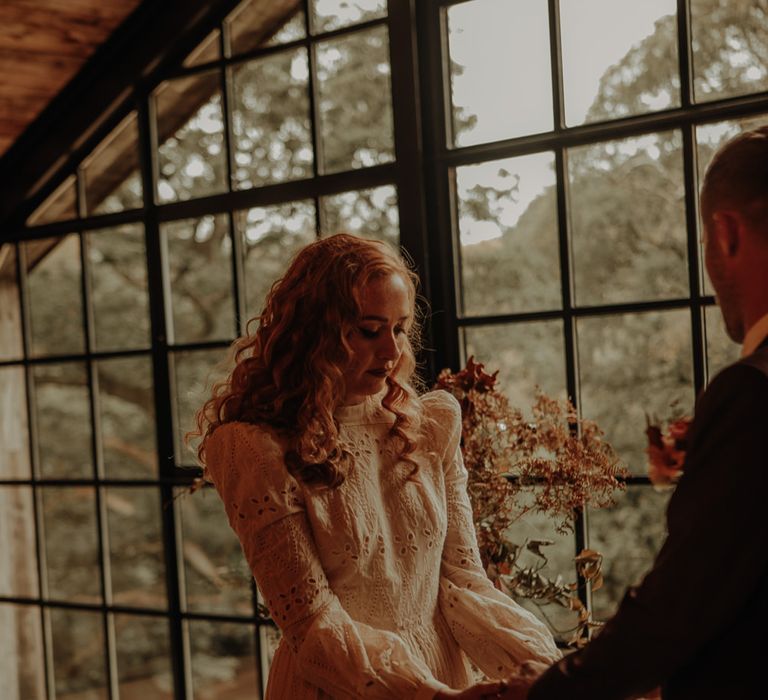 Broderie anglaise wedding dress with flower detail 