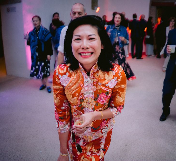 Bride in red and gold Chinese dress 