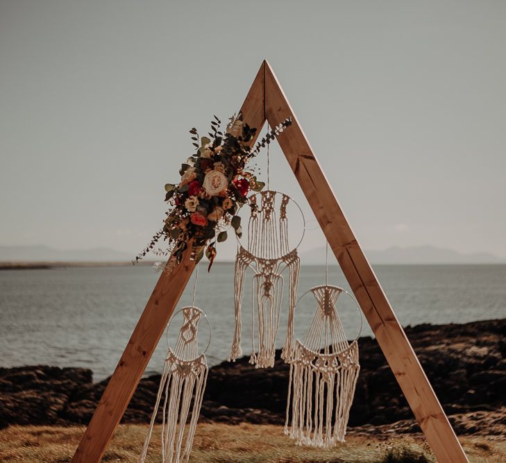 Wooden altar set up with flower decals and handmade weaved dream catchers