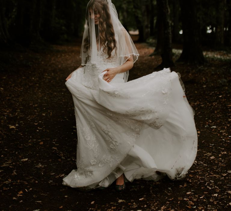 Floral wedding dress with matching tartan shoes and beaded veil