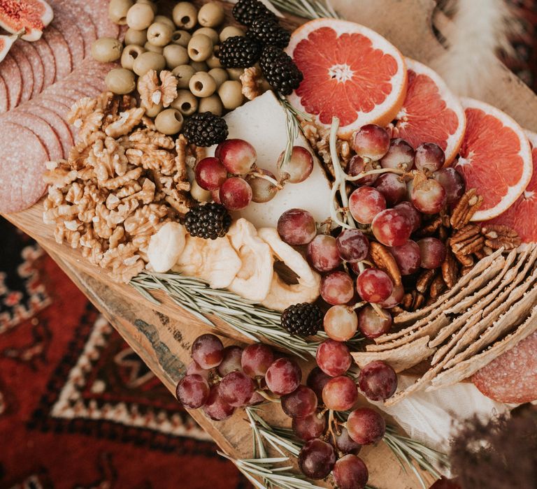 Grazing plate with grapes, walnuts and oranges