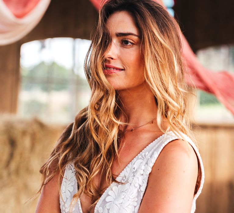 Bride with golden hair blowing in the wind