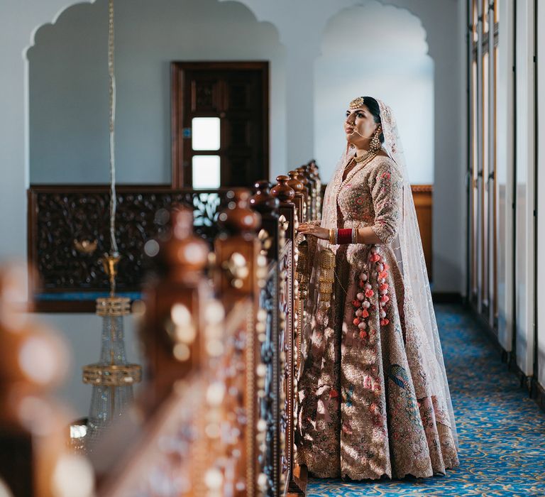 Bride wears pastel colours with beautifully embroidered Lehengha