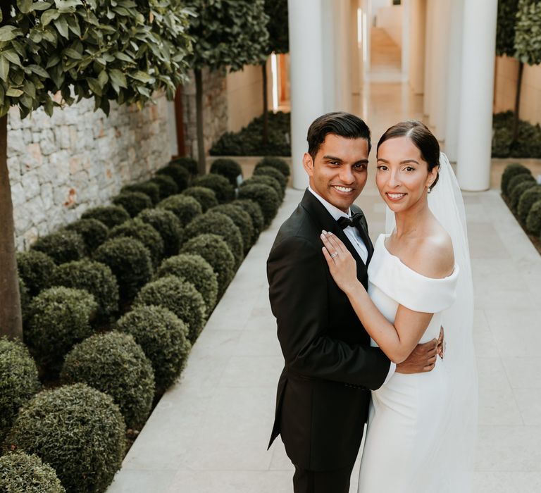 Bride & groom stand in front of Villa 20 on their wedding day | Hannah MacGregor Photo & Film