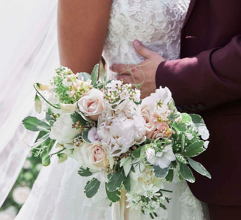 Romantic pink, white and green wedding bouquet 