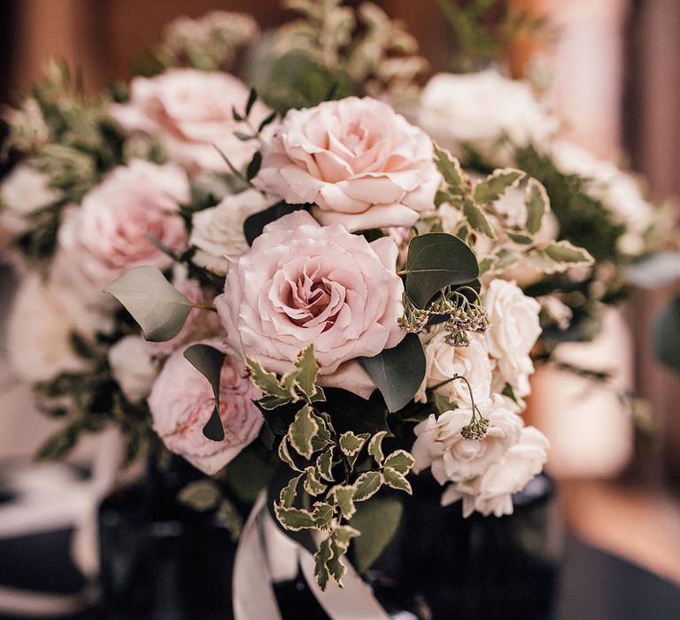 Pink and white garden rose bridal bouquet for a classic and traditional black tie wedding 