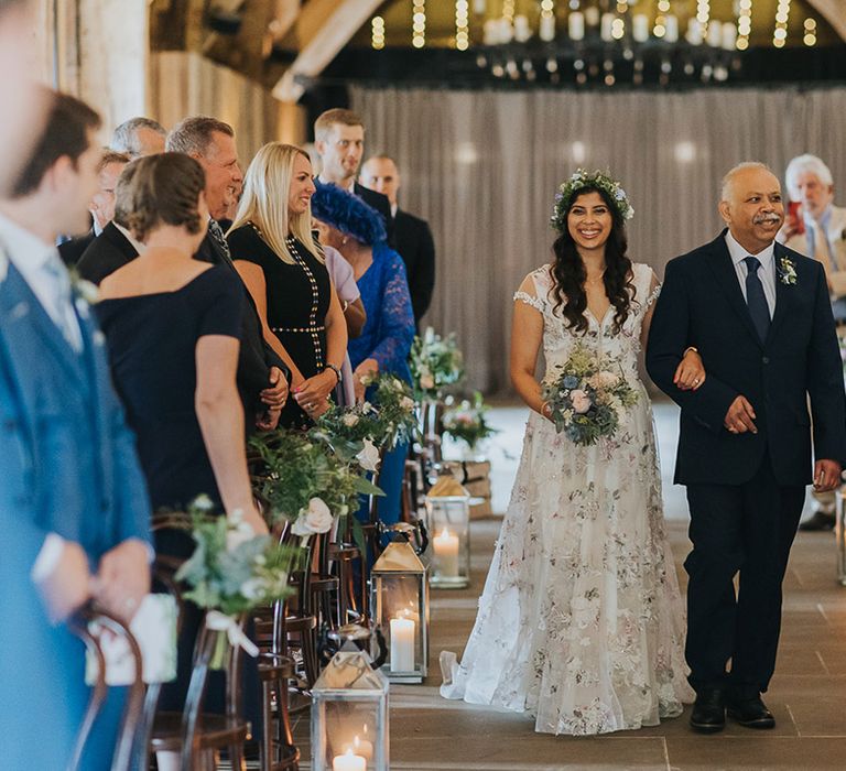 father of the bride walking his daughter down the aisle at The Tithe Barn Bolton Abbey