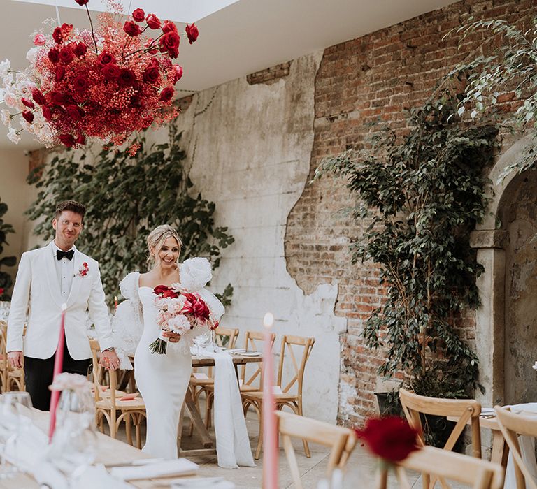 Middleton Lodge wedding venue with red and pink gypsophila flower cloud 