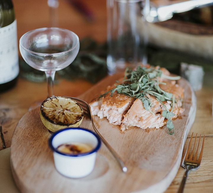 Salmon wedding food on a wood slice