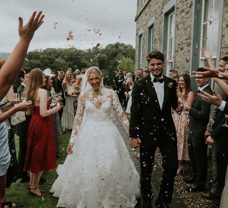 Silverholme Manor wedding with traditional confetti exit for the bride and groom at their back tie wedding 