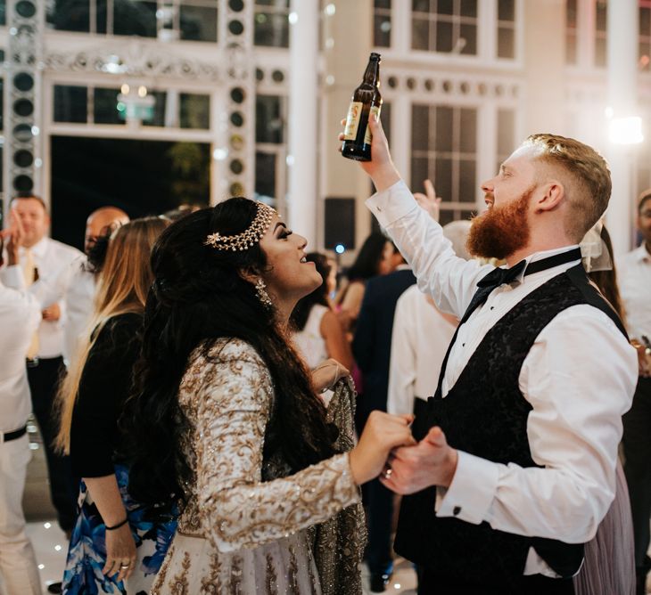 Bride and groom on the dance floor at Syon Park Orangery wedding