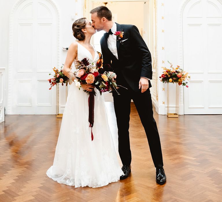 Bride and groom just married at Carlton House Terrace autumn wedding 