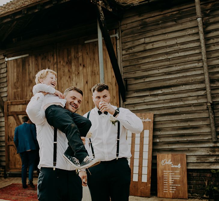 Wedding guests playing in the courtyard