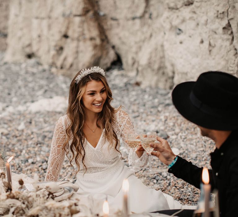 Bride in lace wedding dress with geode crown headdress