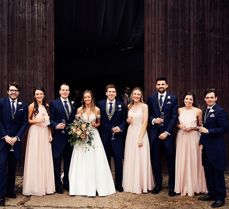 Bridal party photography shot at barn wedding