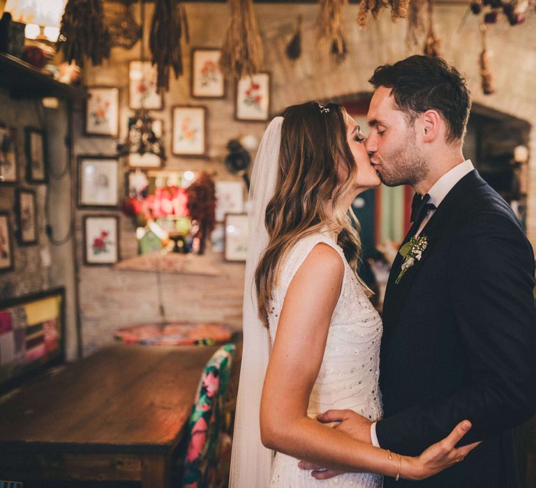 Bride and groom kissing at their Tuscany Italy wedding 