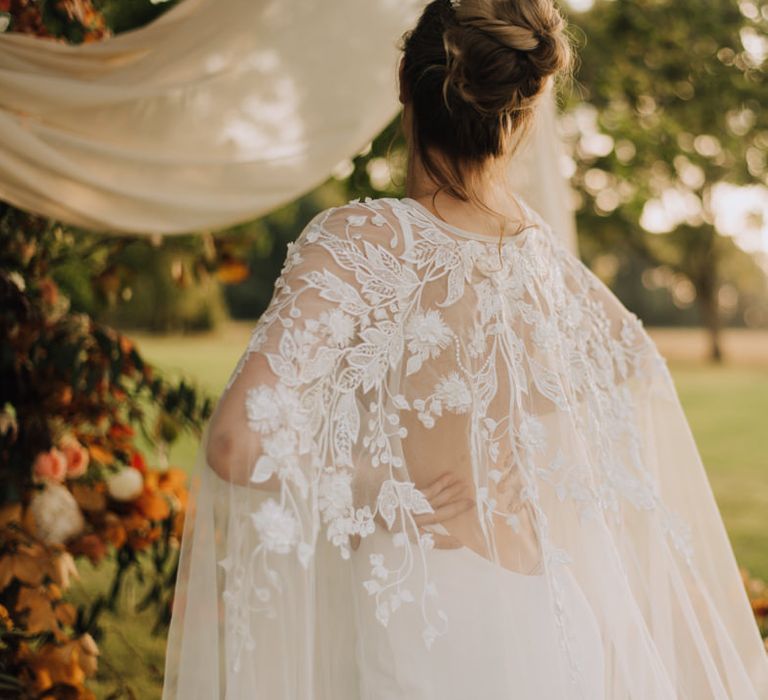 Lace details on bridal cape