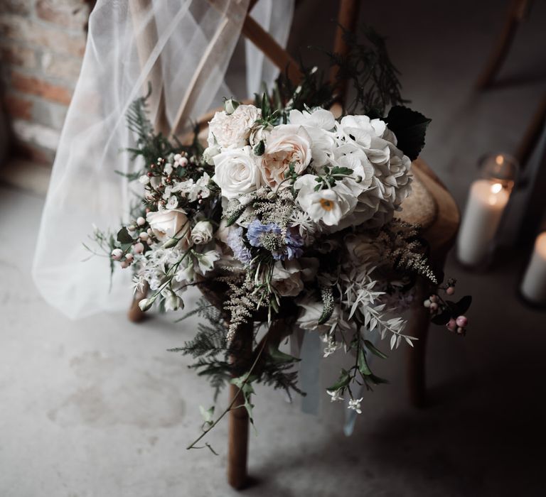 Romanitc white wedding bouquet for rustic barn wedding