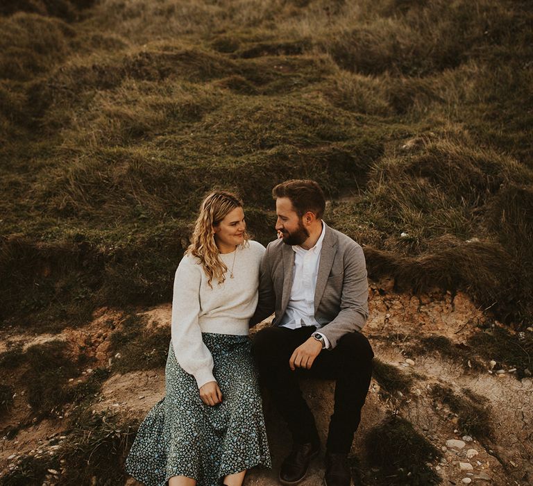 Bride and groom for beach engagement shoot in England