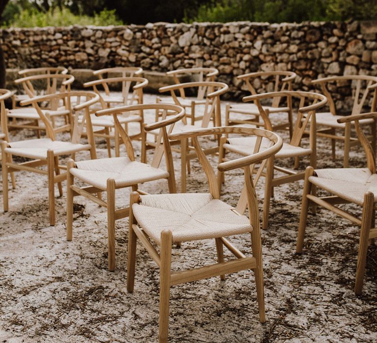 Wooden chairs with woven seating