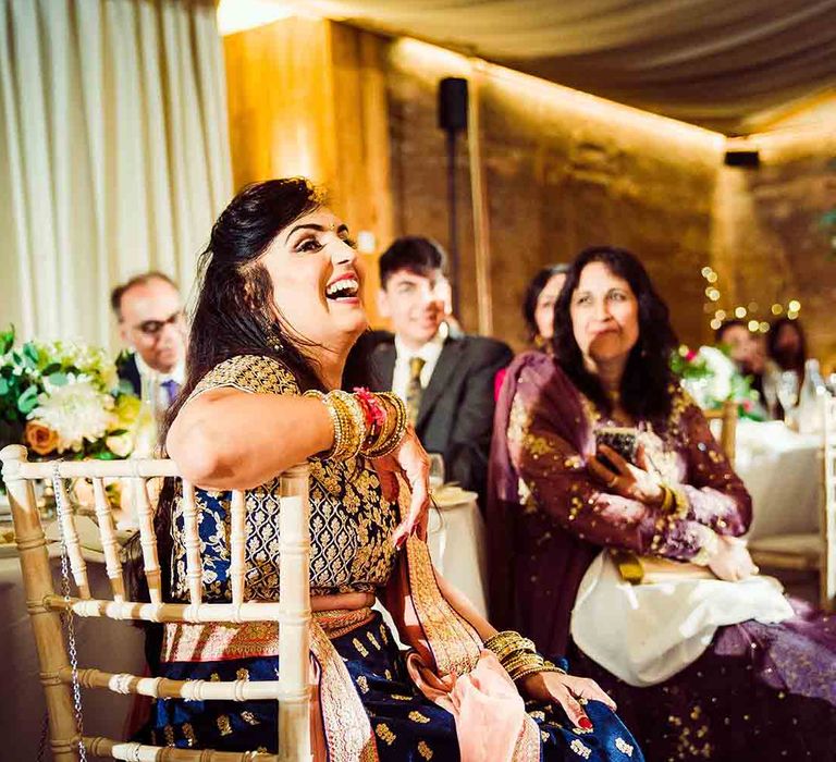 Guests enjoy wedding speeches