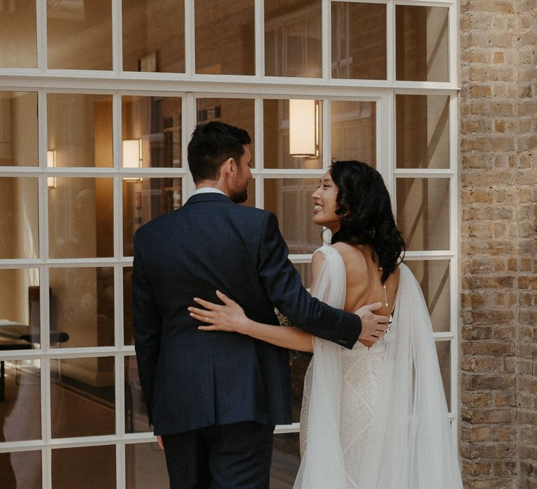 Bride and groom leaving their wedding ceremony arm in arm