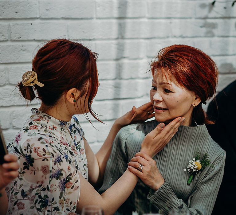 Bride and mother of the bride intimate wedding portrait 