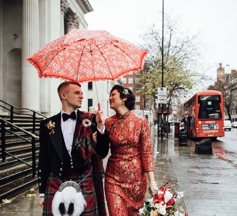 Red cheongsam dress for bride at London wedding 