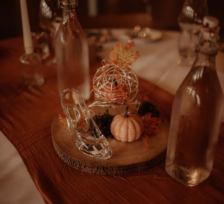 Cinderella inspired centre piece complete with pumpkin and glass slipper