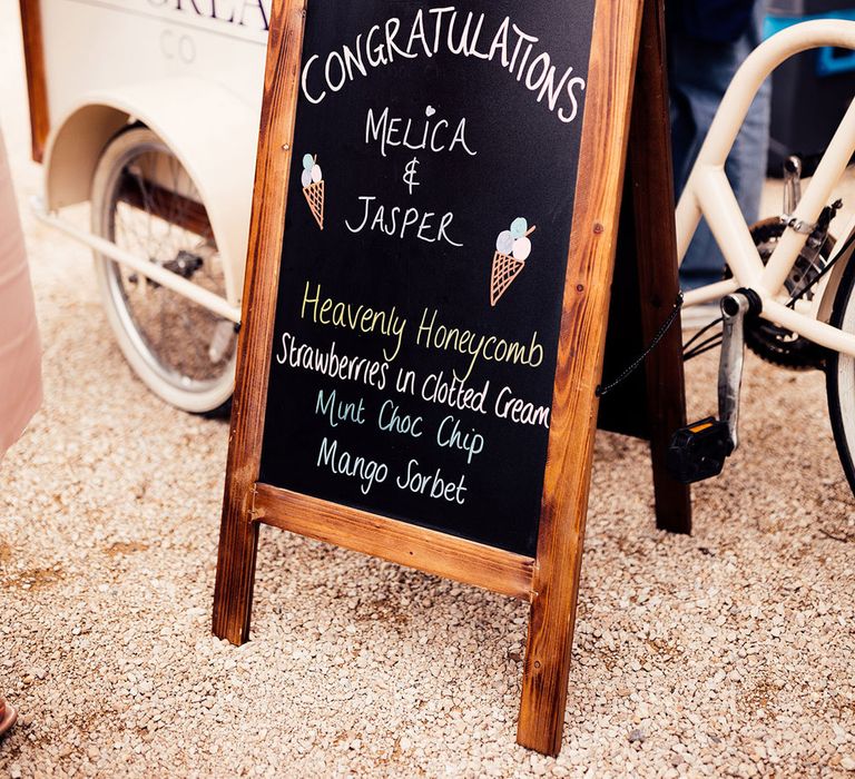 Chalkboard wedding sign for ice cream cart at Elmore Court wedding in the Cotswolds