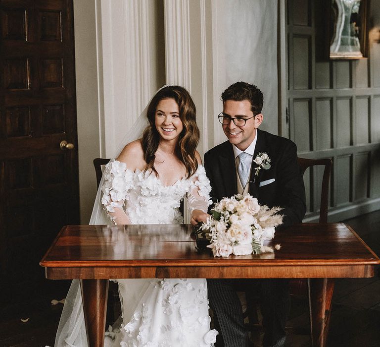 Bride and groom at civil ceremony at Elmore Court