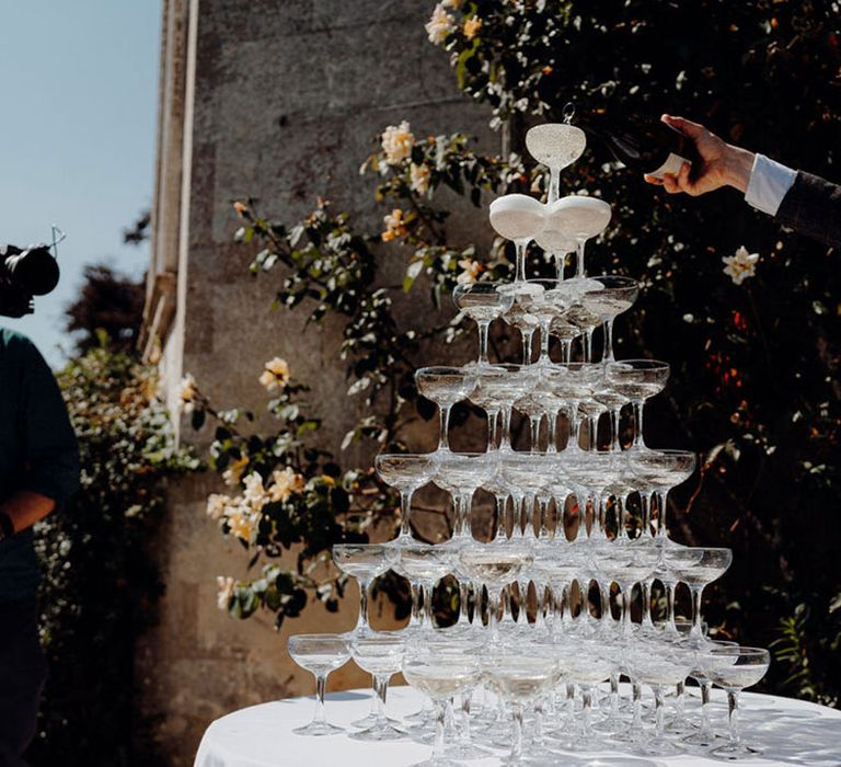 Champagne tower with coupe glasses