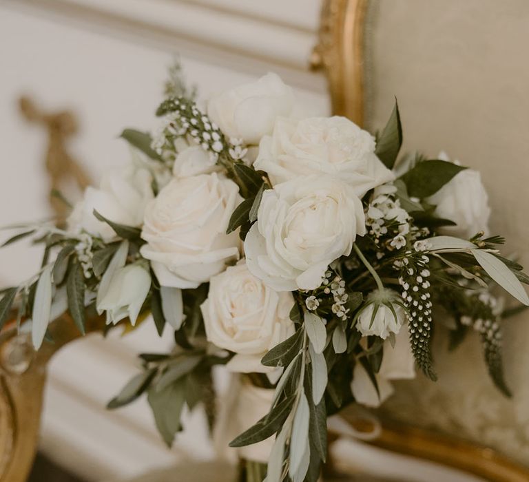 White rose bridal bouquet complete with green foliage for wedding in the South of France