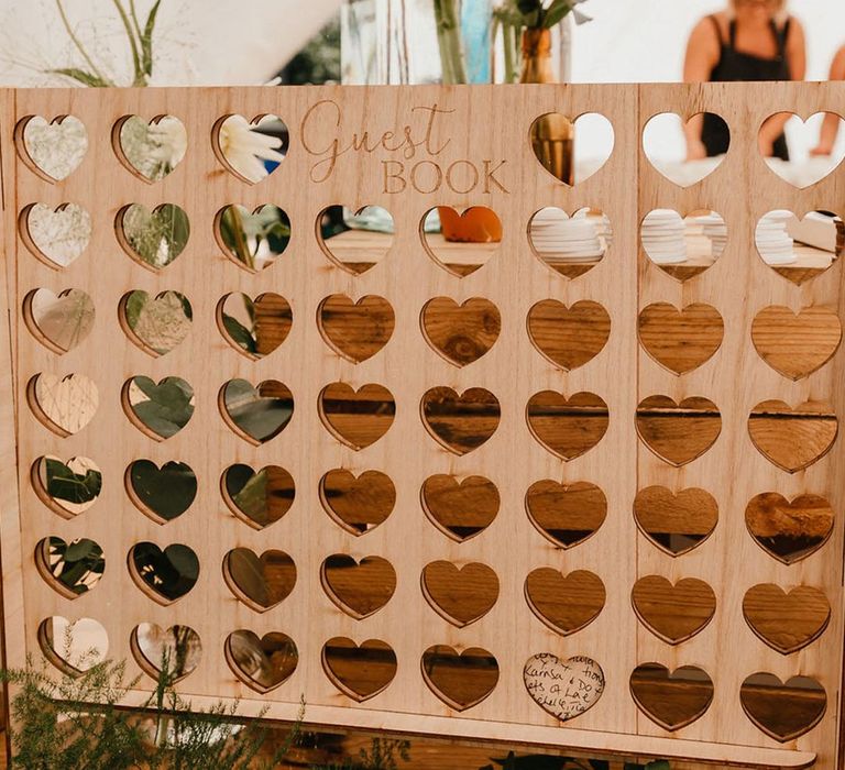 Connect Four style wedding guest book 