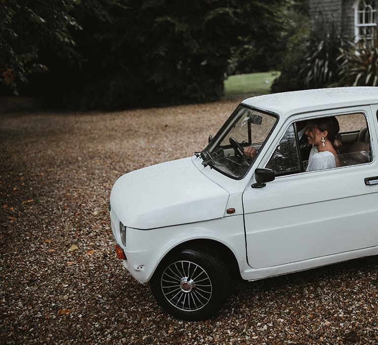 Vintage Fiat 126 white wedding car for intimate Cornish wedding at Treseren